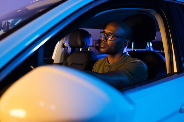istock African American driving at the night 1648663501