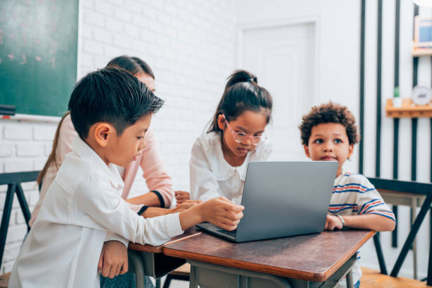 istock Happy school teacher and students having interesting engaging activities in class. 1648666352