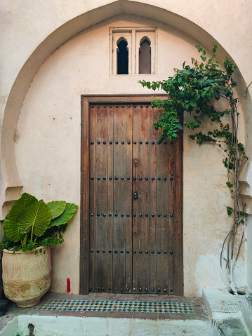 An old traditional Moroccan door in the ancient city of Tangier Morocco