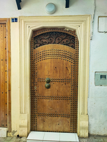 An old traditional Moroccan door in the ancient city of Tangier Morocco