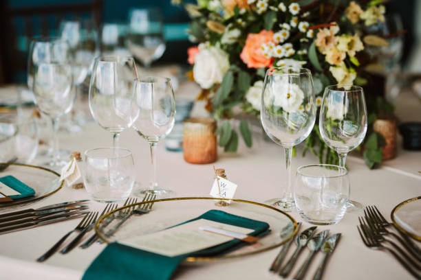 istock Table set up for a special event and a Menu list. 1648703465