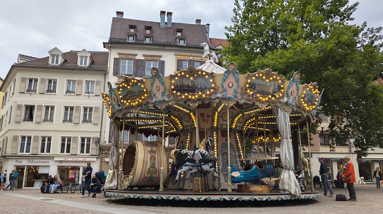 Mulhouse, France – May 19, 2023: A merry-go-round carousel in the city square in Mulhouse, France