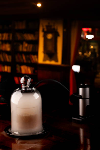 istock smoking drink with cocktail smoker in pub blurred background 1648730673
