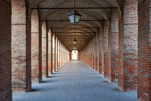 Sabbioneta (Mantova, Lombardy, Italy) - The ancient building called The Gallery: a very long colonnade made with red bricks