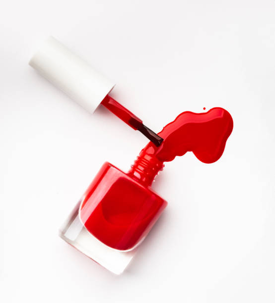 istock Red nail polish bottle 1648747703