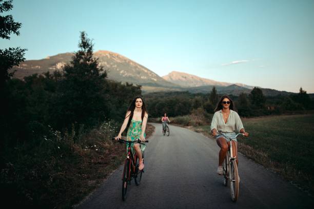 istock Beautiful women riding bikes 1648747721