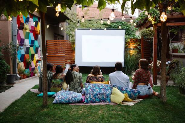 istock People watching a movie on a projection screen 1648759594