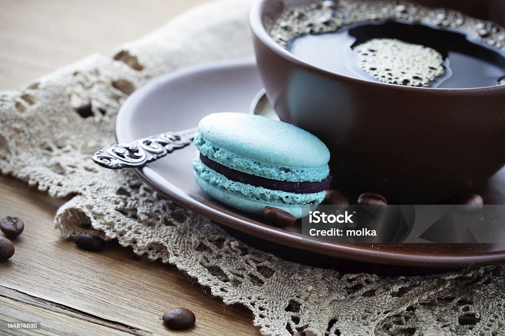 Coffee with macaroons Cup of hot coffee with french macaroon Black Color Stock Photo