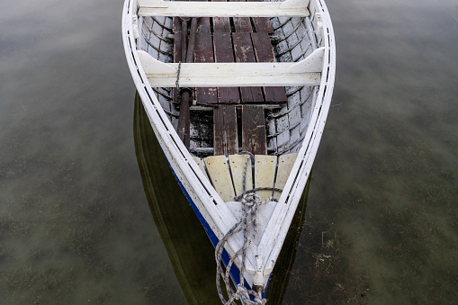 small retro fishing boat detail on Lake Balaton with water .
