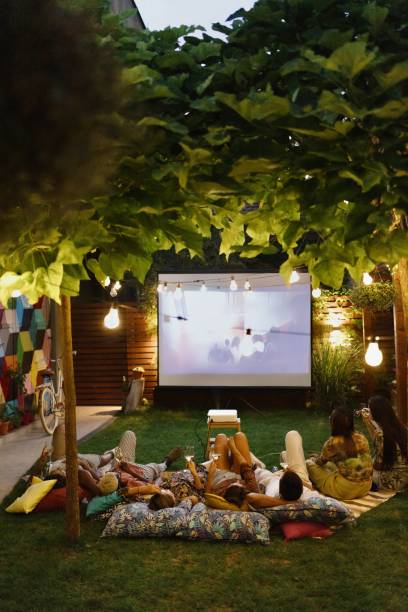 istock Friends watching a movie at night 1648767734