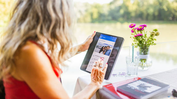 istock Senior woman using social media 1648777964