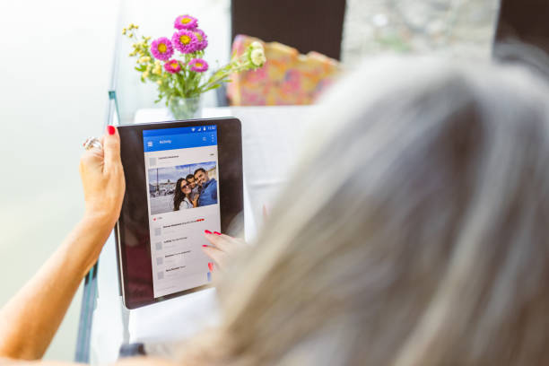 istock Senior woman using social media 1648777966
