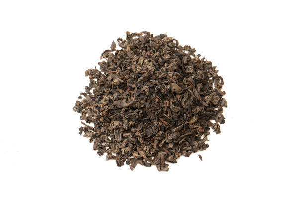 istock Dried tea leaves isolated on a white background. 1648798139