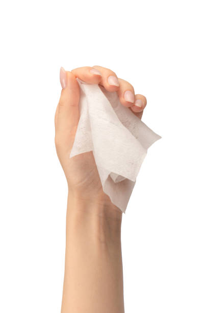 istock Wet wipe in a woman hand isolated on a white background. 1648799208