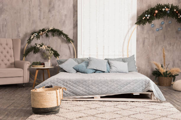 istock Modern bedroom with Christmas decorations 1648819754