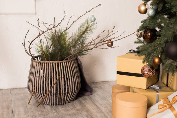 istock Basket and presents under the Christmas tree 1648820299