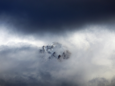 Cloud shrouded mountain peak in the Lost River Range of Idaho.