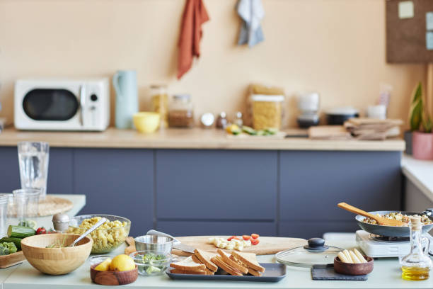 istock Kitchen interior with food and ingredients on kitchen counter 1648838706