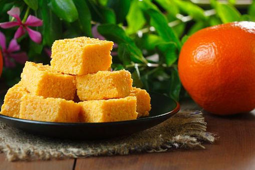 Orange burfi is a delicious Indian sweet or dessert made from fresh orange juice, sugar, and sometimes other ingredients like milk powder, ghee (clarified butter), and nuts. It's a popular dessert, especially during festivals and special occasions.