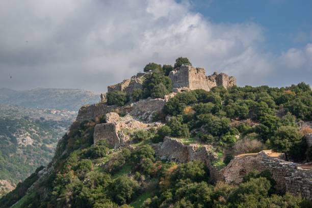 istock a mountain with a small castle on the top of it 1648882629