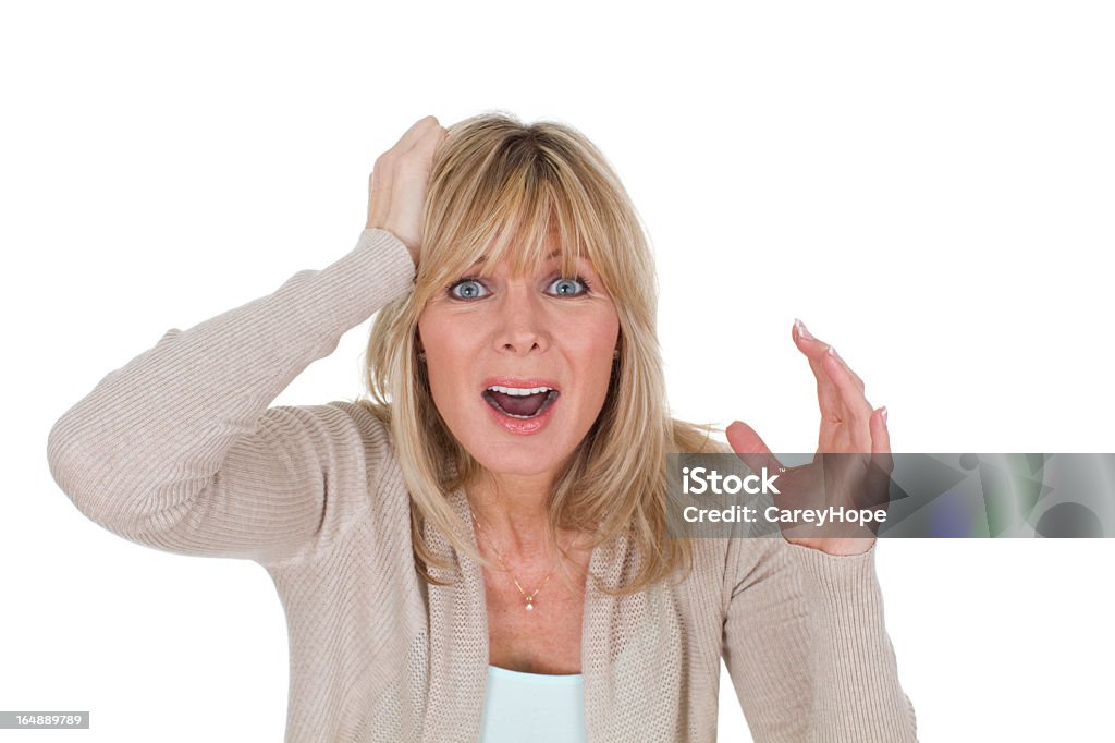 frustrated woman frustrated mid adult woman isolated on white background Cut Out Stock Photo