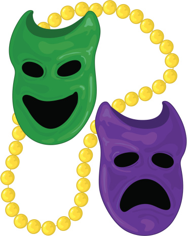 Dichotomy masks for Mardi Gras and a gold bead.