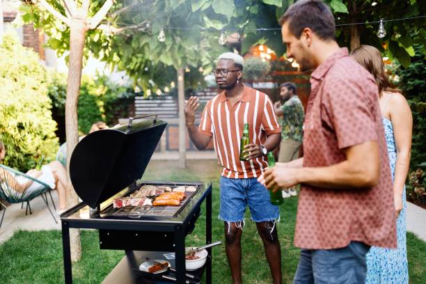 istock Funny friends making a barbecue and enjoying 1648939477