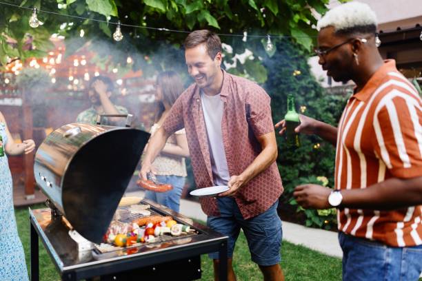 istock People having a barbecue party 1648941730