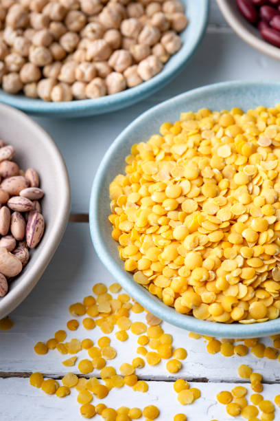 istock Different types of legumes in bowls - yellow lentils 1648942631
