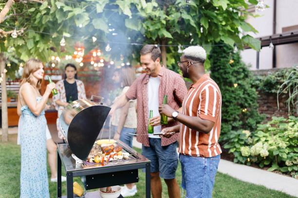 istock Beautiful people having a barbecue in the backyard 1648942664