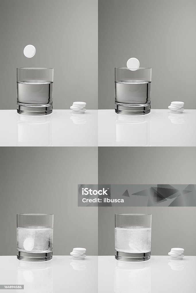 Aspirine Paracétamol comprimés éclabousser en verre d'eau (ordre) - Photo de Comprimés libre de droits