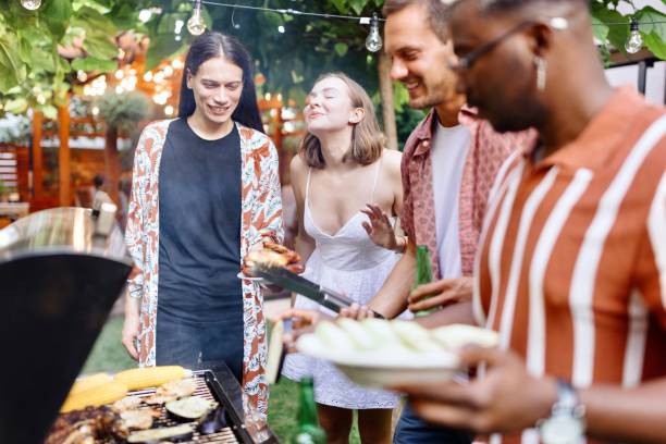 istock Beautiful group of friends making a barbecue 1648949718