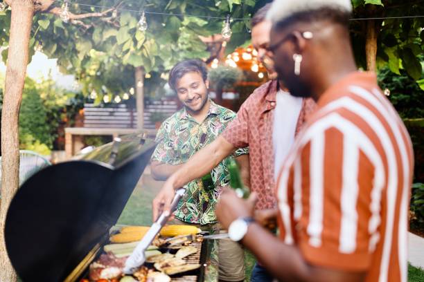 istock Multiracial men talking and preparing a barbecue 1648950835
