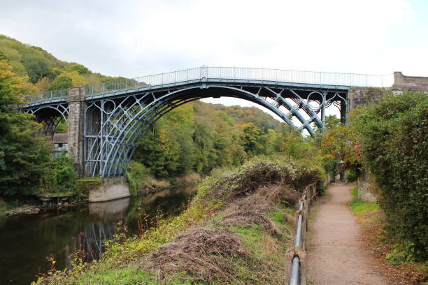 Footpath along the river Severn, which runs parallel under the Ironbridge stock photo