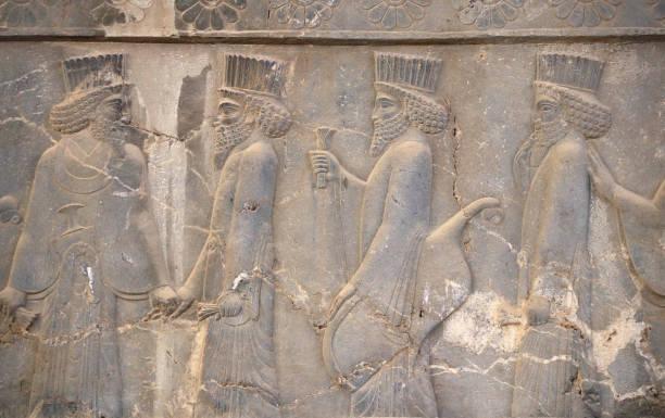istock Ancient wall with bas-relief with assyrian foreign ambassadors with gifts and donations, Persepolis, Iran 1648967167