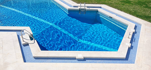 istock Clear blue pool in the park. Closeup. 164898976