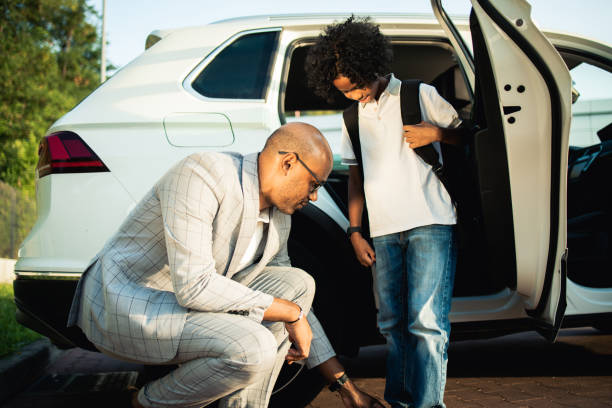 istock Father sending his son to school 1648996059