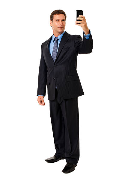 istock Businessman Taking Picture with Mobile Phone Isolated on White Background 164900385