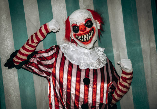 istock evil clown in the circus posing as the muscleman 1649008770