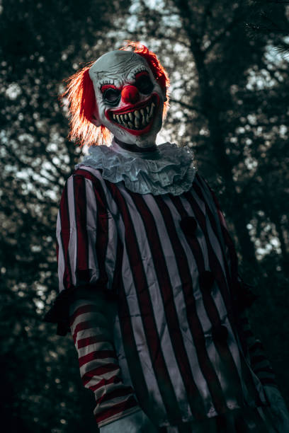 istock mad evil redhead clown in the woods 1649009802