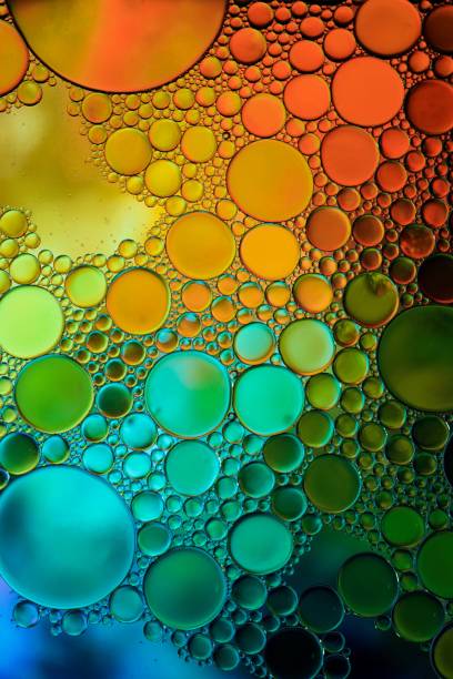 istock multicolored oil circles on the water, abstract background 1649015213