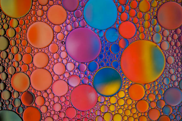 istock multicolored oil circles on the water, abstract background 1649015707