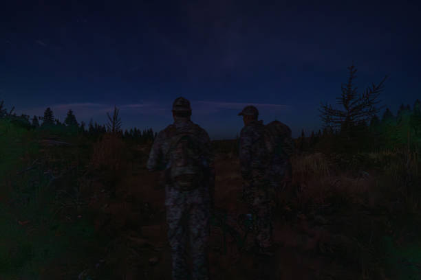 istock Two hunters hike, calling for elk wild game in Washington State 1649016277