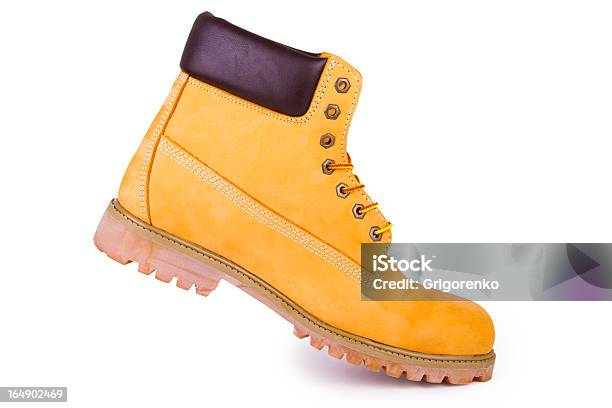 Foto de Amarela Boots e mais fotos de stock de Amarelo - Amarelo, Fotografia - Imagem, Horizontal
