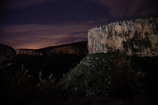 Beautiful views of the rocky wall of Chulilla, village of Valencia in Spain at night