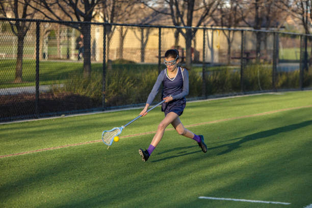 Girl Playing Lacrosse 2