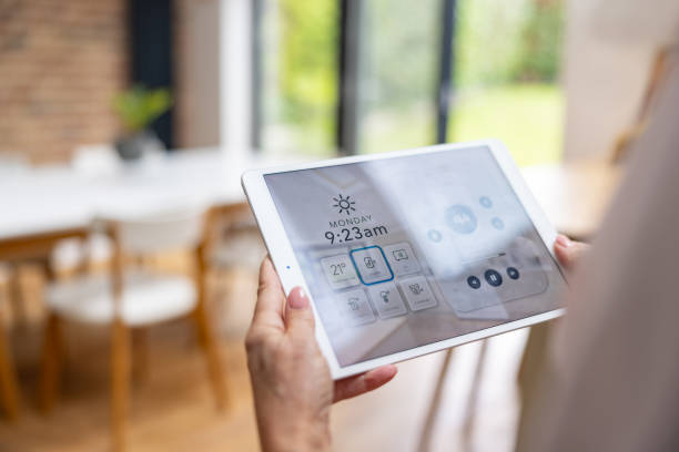 istock Close-up on a woman using an automated system in her smart home 1649042179