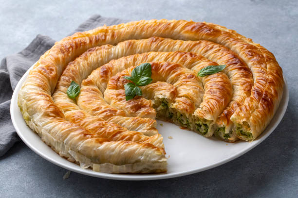 istock Turkish Tepsi Boregi, Round Borek, Tray pastry (Turkish name; rulo borek) 1649045367