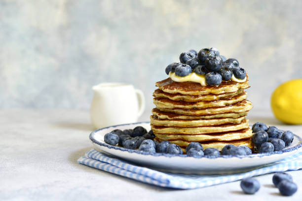 istock Lemon pancakes with fresh blueberry and whipped cream. 1649059447