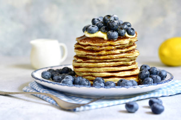 istock Lemon pancakes with fresh blueberry and whipped cream. 1649064140